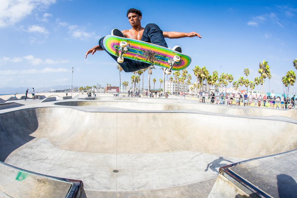 Skateboarder catches air at Venice Skatepark.