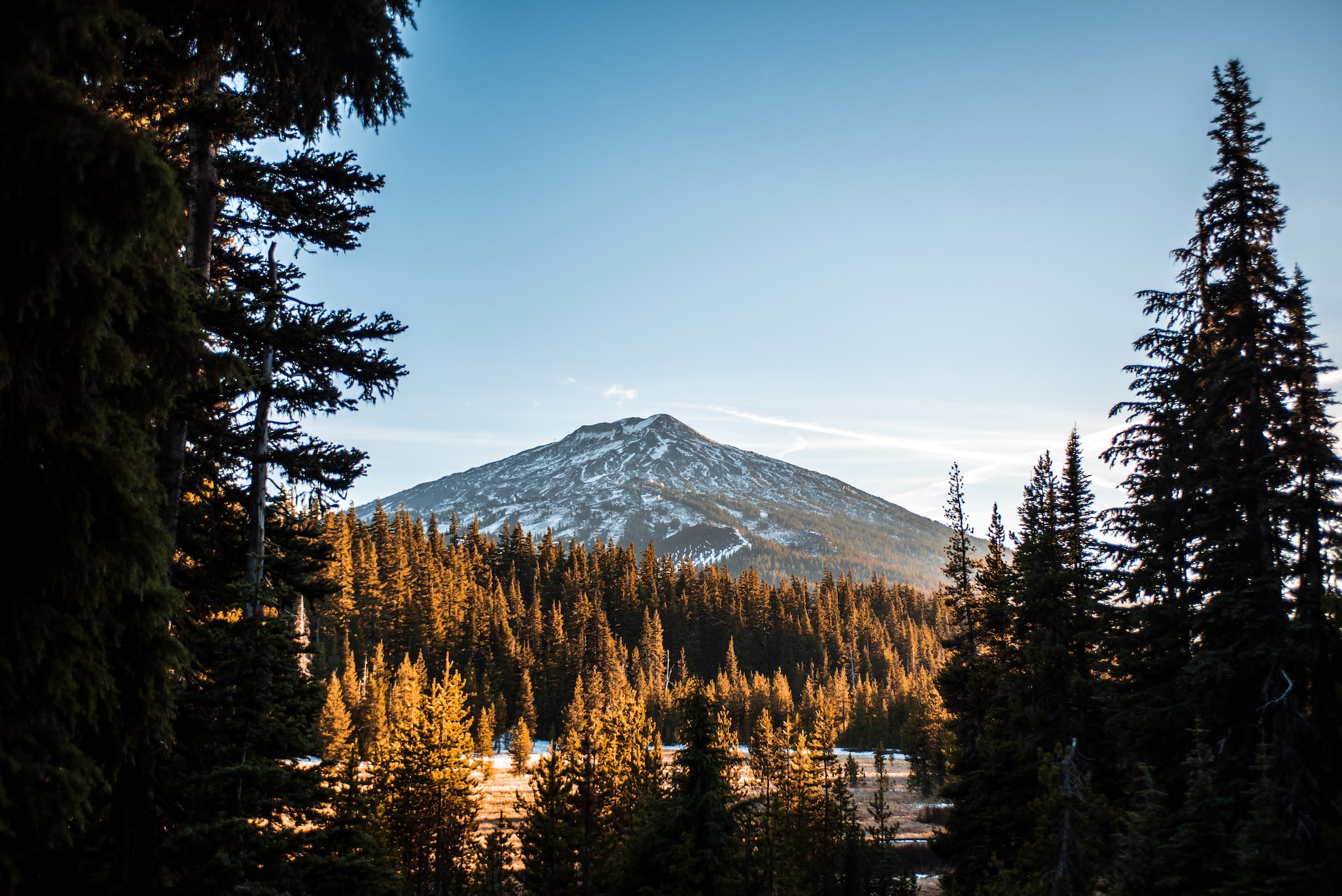Mount Bachelor covered in snow in the fall.