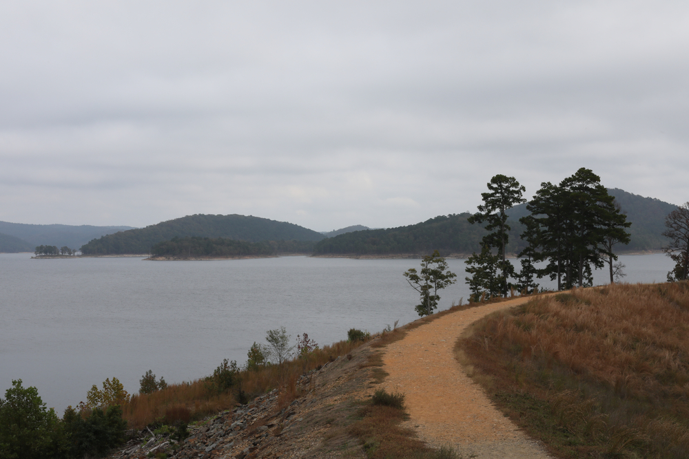 An outdoor trail winding along the Broken Bow Lake.