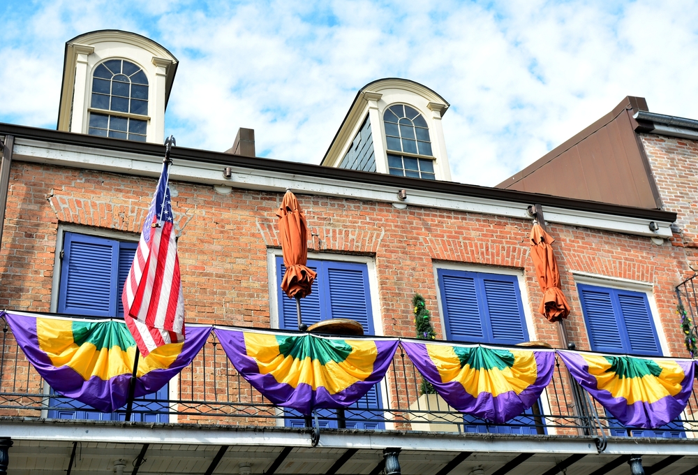 Balconies in the New Orleans French Quarter decorated for Mardi Gras.