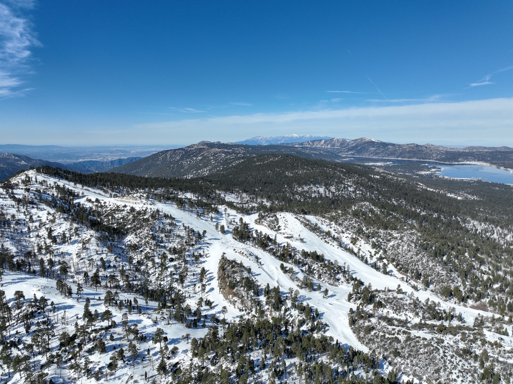 Aerial view of mountain ski resort with beautiful winter landscape in Big Bear Lake.