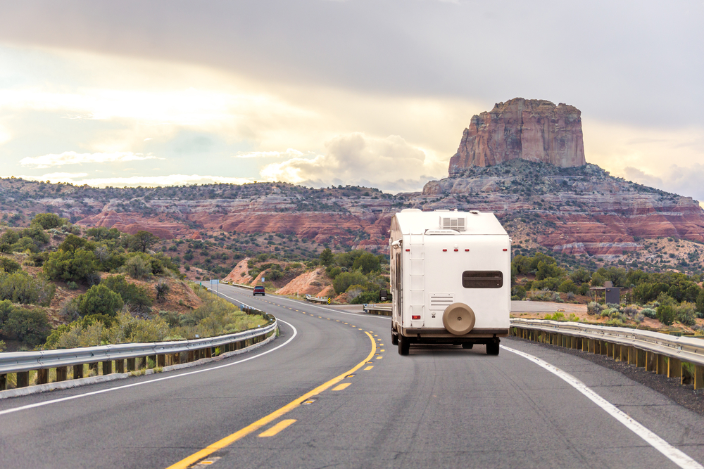 rv-driving-through-red-rock