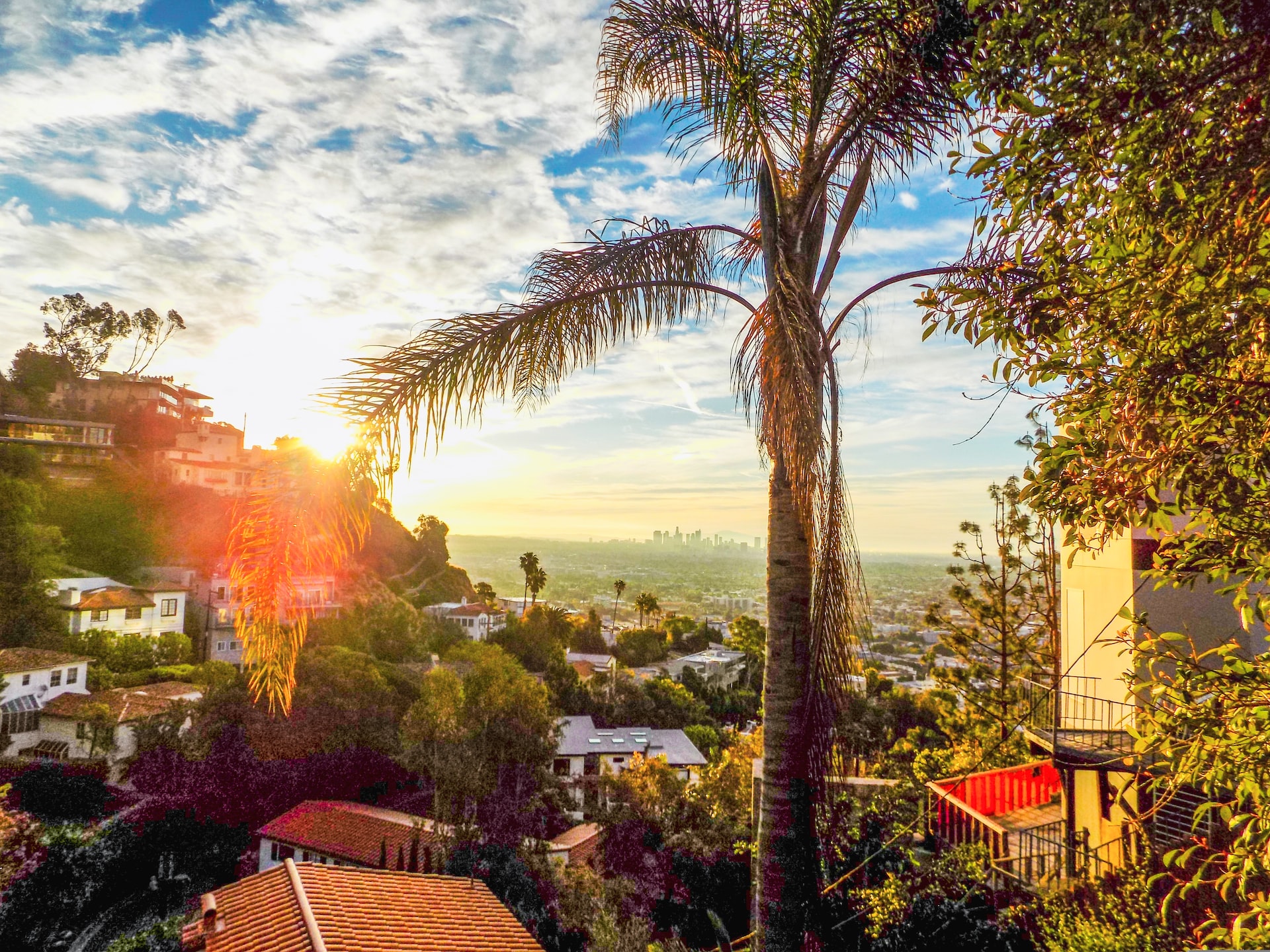 A view of downtown Los Angeles' skyline from the West Hollywood Hills just after sunrise in March 2020.