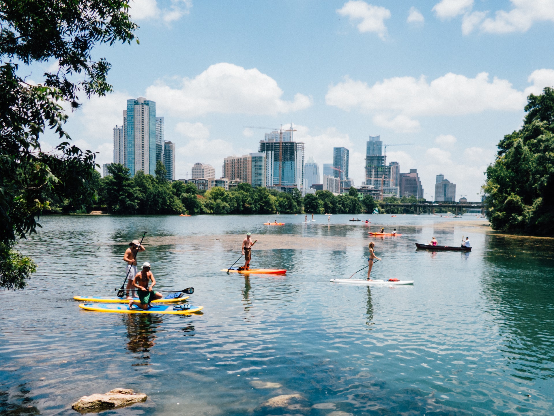 Downtown Austin view over the water from Lou Neff point of Lady Bird Hike and Bike Trail.