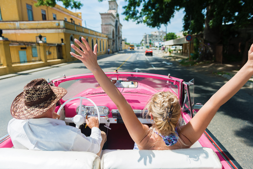 travelers-in-car-in-cuba