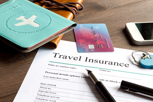 travel-insurance-paperwork-and-passport