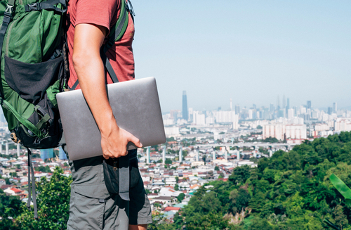 man-holding-laptop