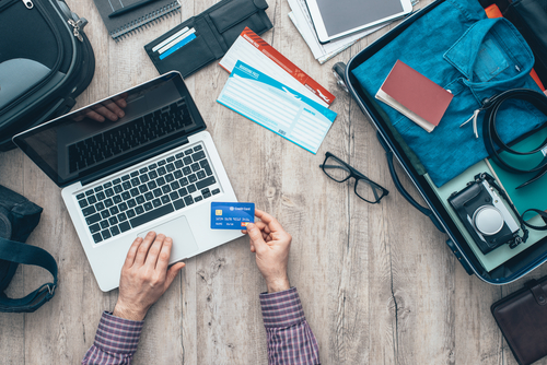 person-booking-on-laptop