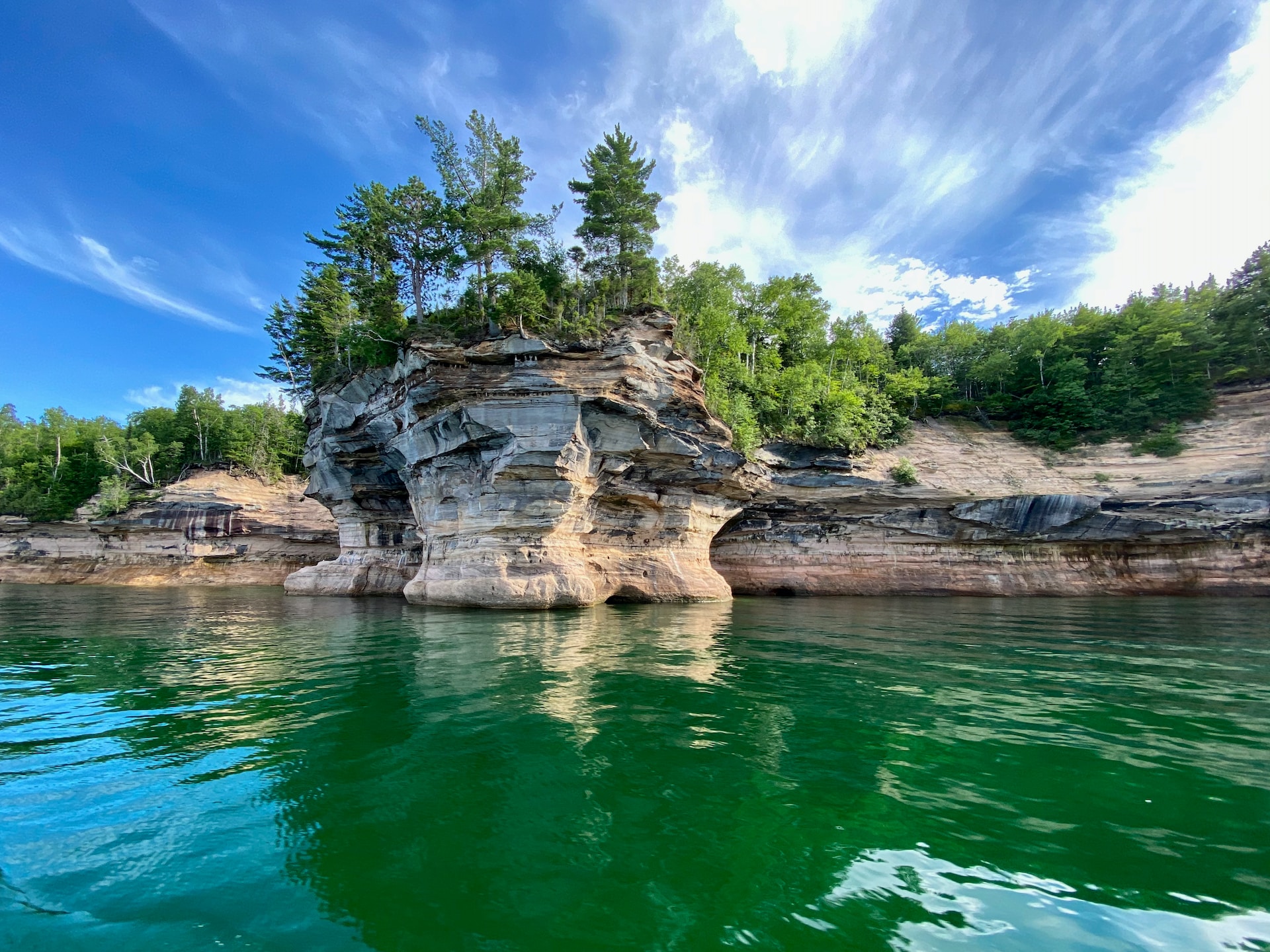 A picturesque blue sky afternoon along Pictured Rocks National Lakeshore on Lake Superior in Michigan’s Upper Peninsula.