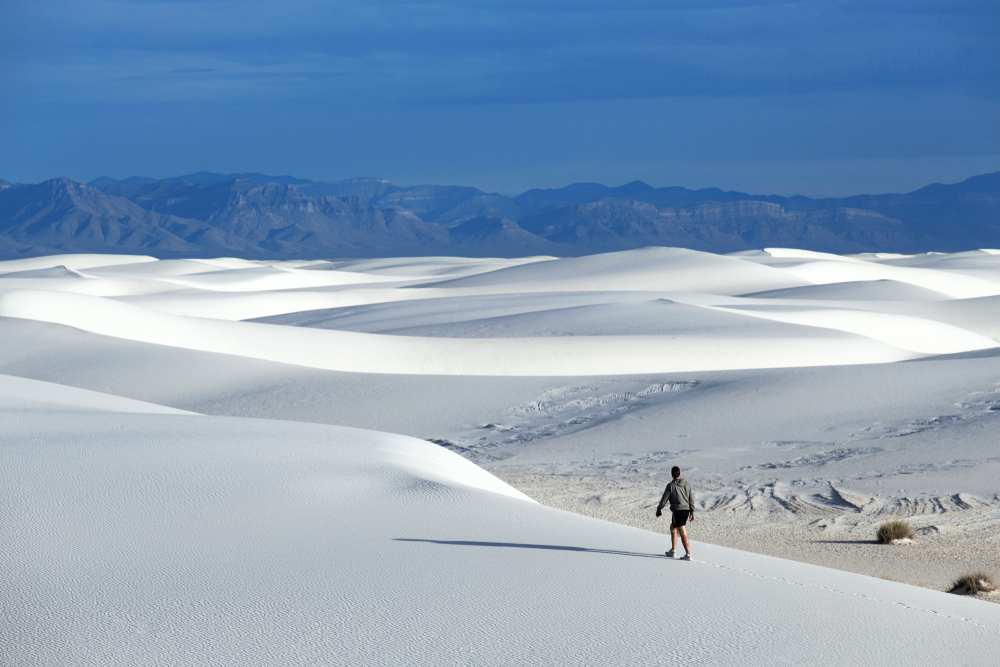Person walking through White Sands National Park