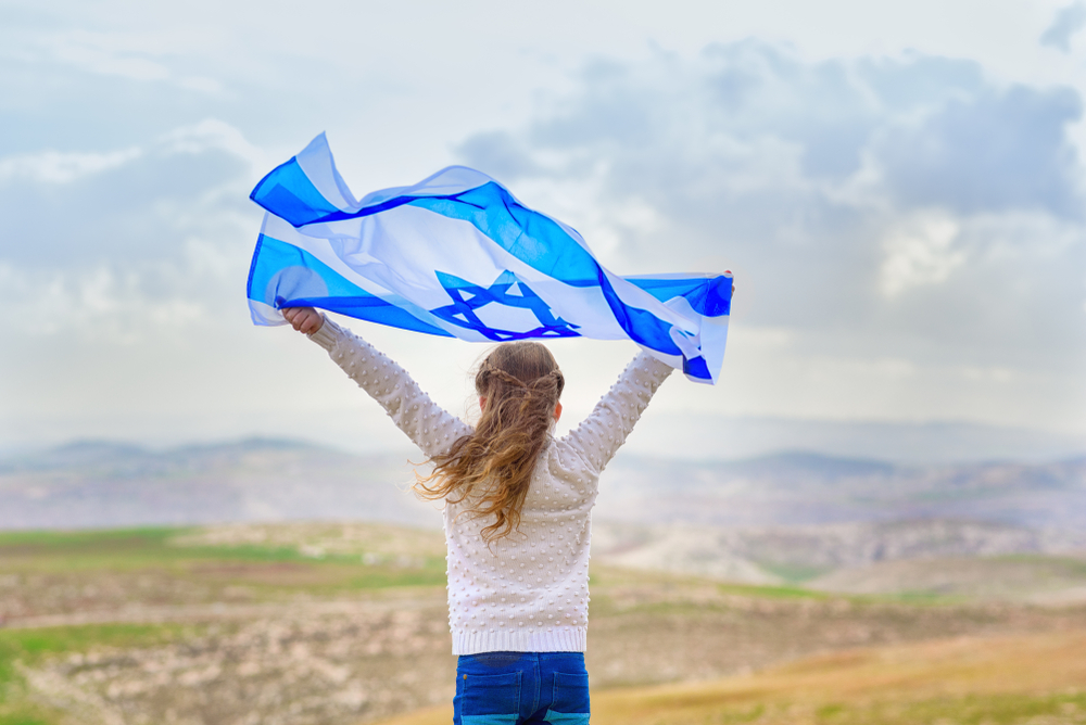 girl-holding-israel-flag