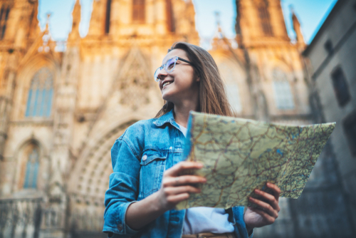 woman-holding-map-in-barcelona