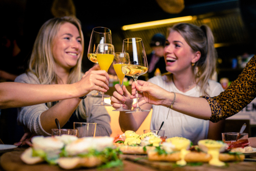 women-drinking-mimosas