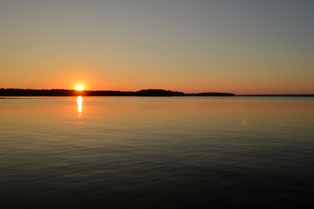 Sunset reflects on High Rock Lake, NC.