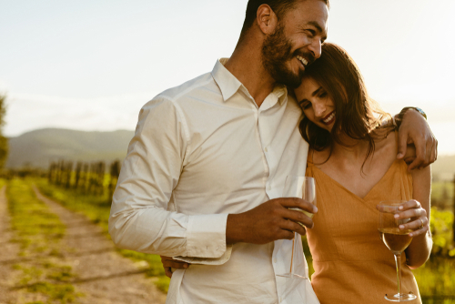 couple-walking-in-vineyard