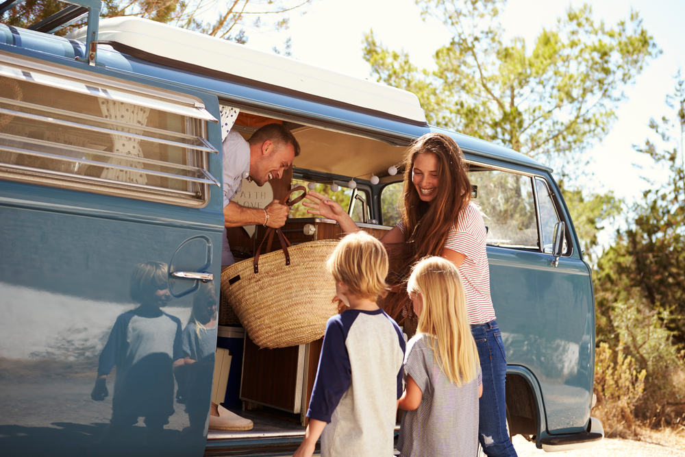 A family gearing up for a road trip.