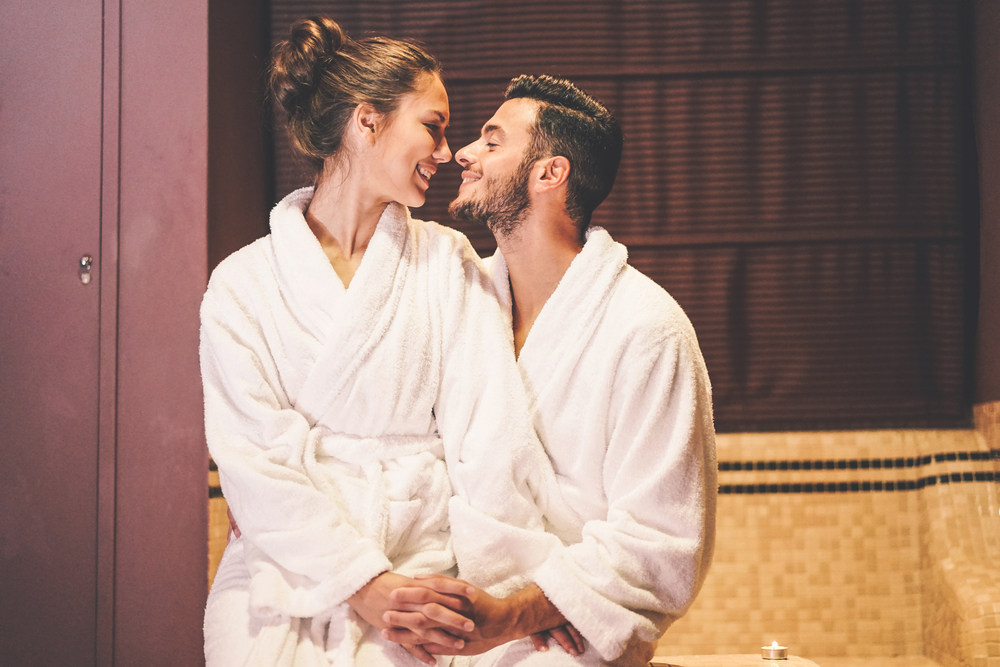 A couple relaxing at a spa.