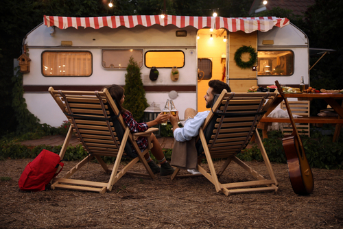 couple-cheers-while-camping