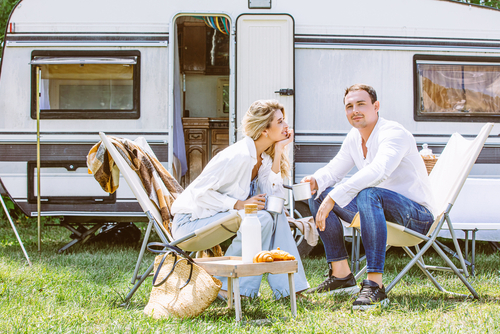 people-sitting-outside-trailer