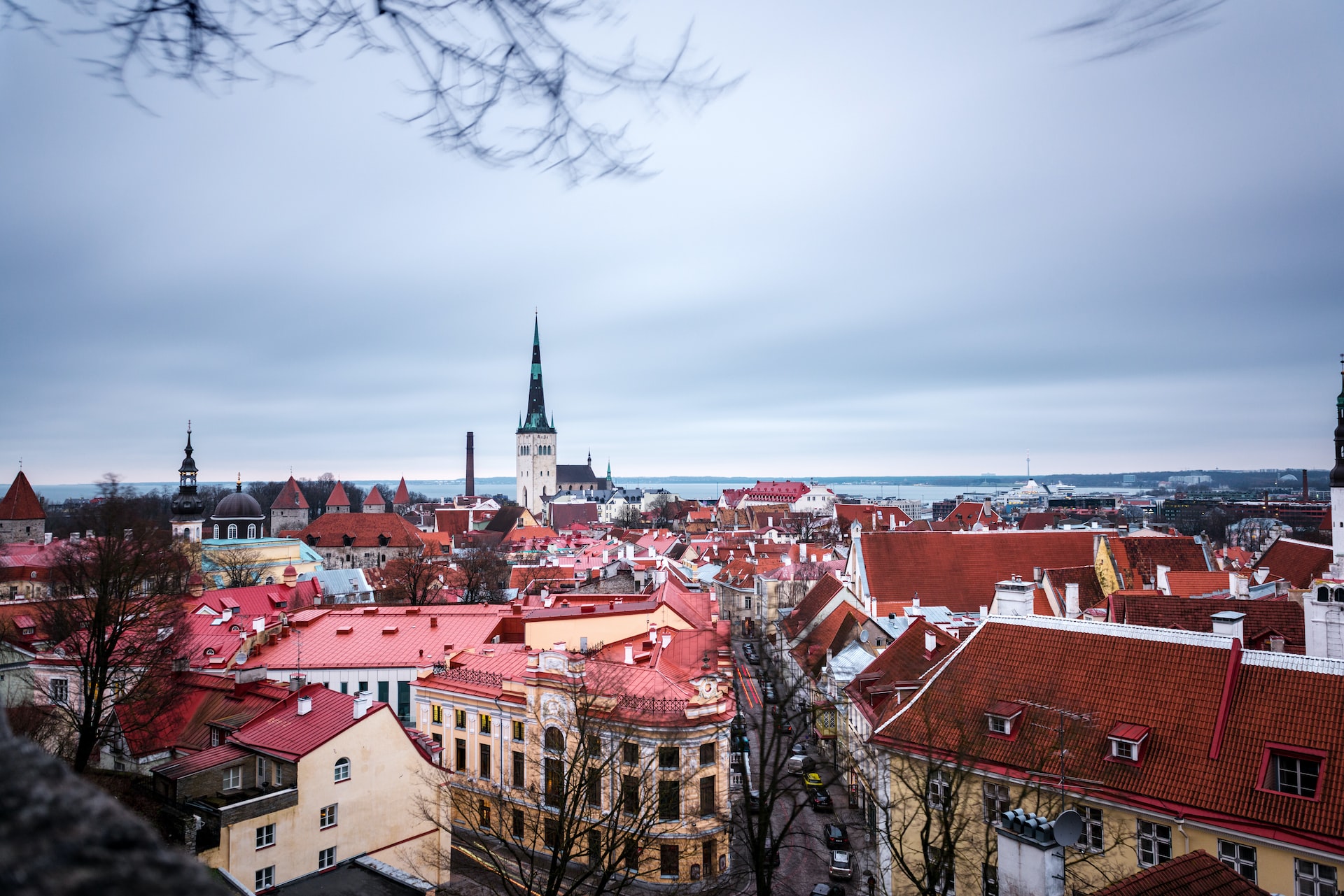 Aerial view of Tallinn’s old town on a cold cloudy Autumn afternoon, with the Baltic sea in the background. Long exposure.