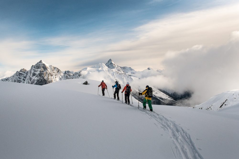 skiiers-hiking-in-canada