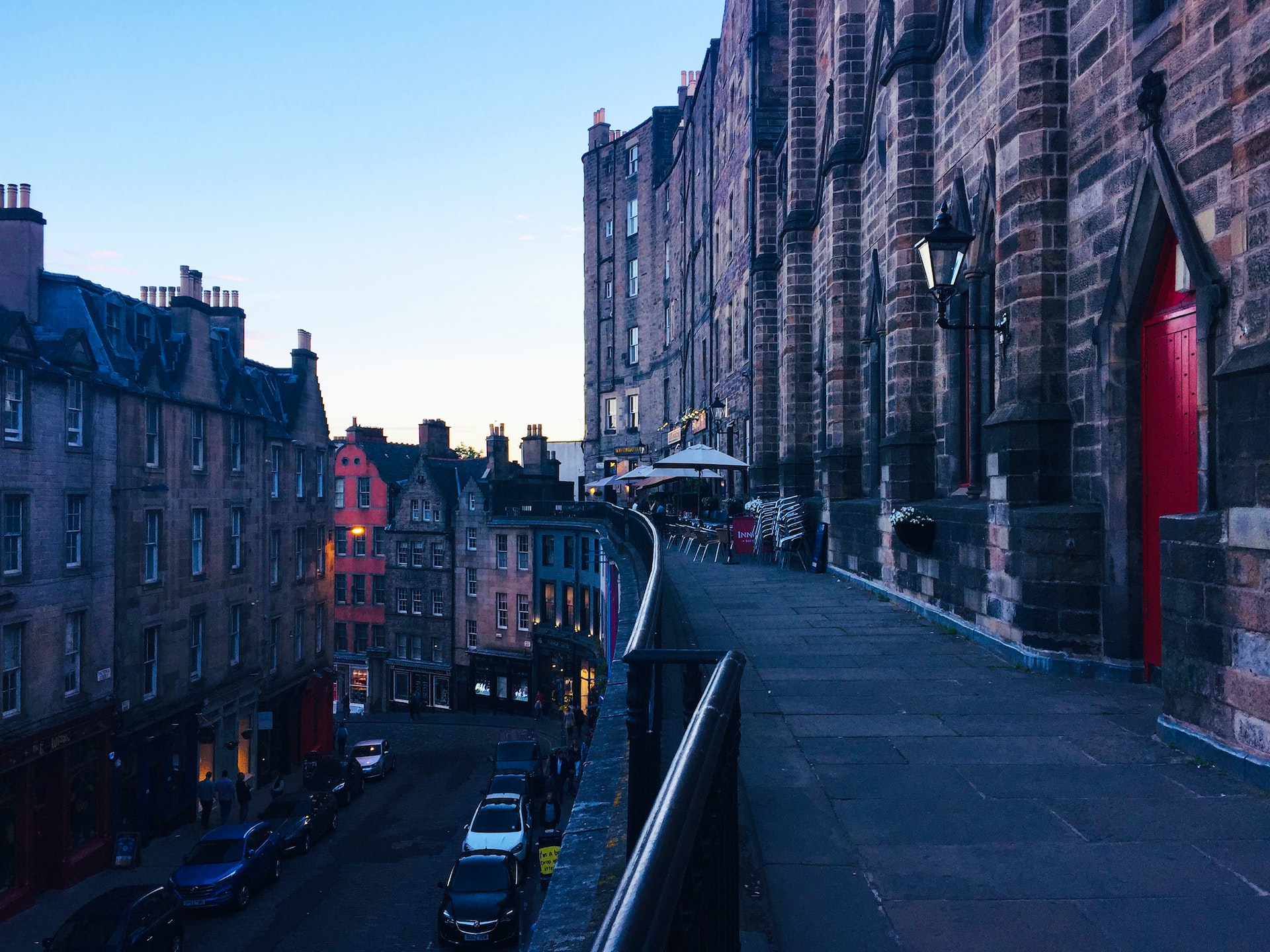 Night falling on cobblestone streets in Edinburgh.