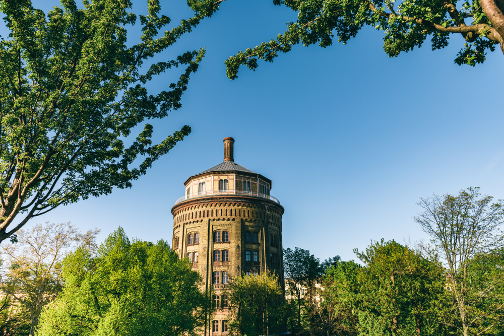 Old stone water tower in Prenzlauer Berg in springtime.