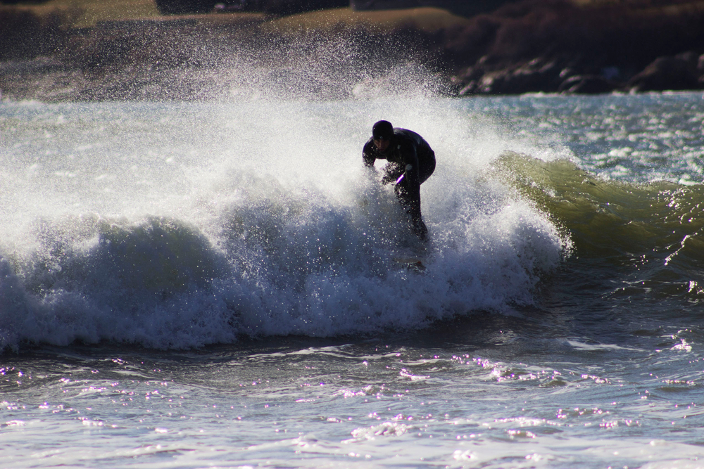 Surfers in Narragansett, Rhode Island.