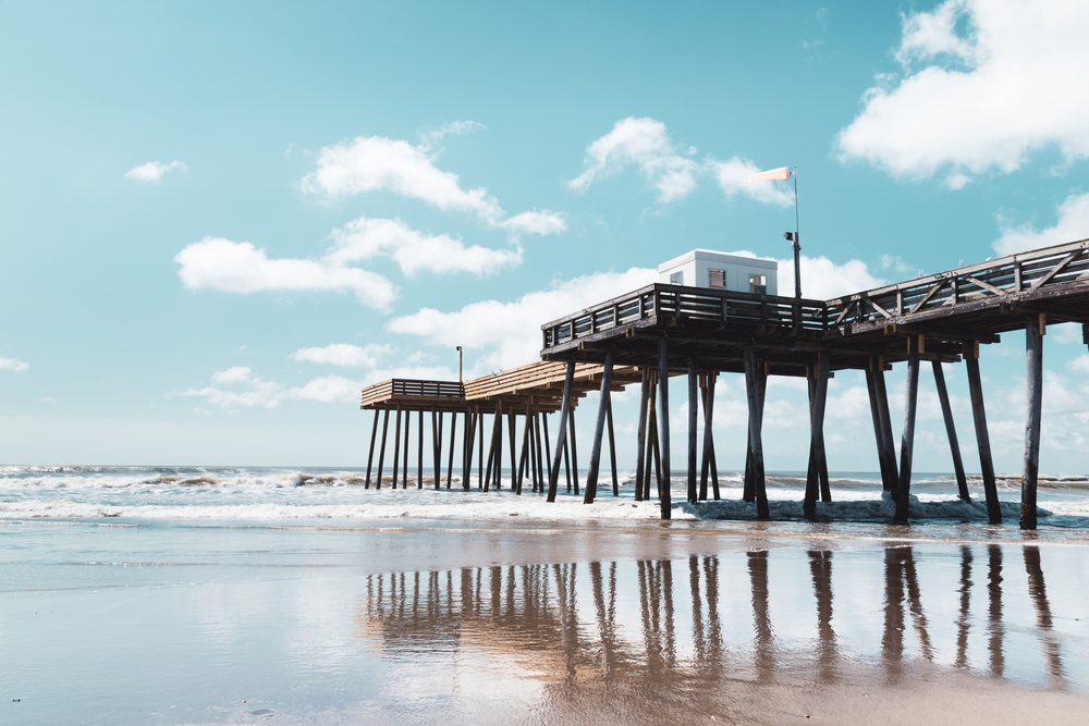 The pier jutting out into the water in Ocean City, New Jersey.