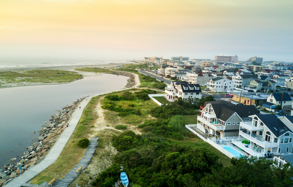 Sunset over the North Wildwood sea wall, aerial view of the gorgeous mansions in this neighborhood.