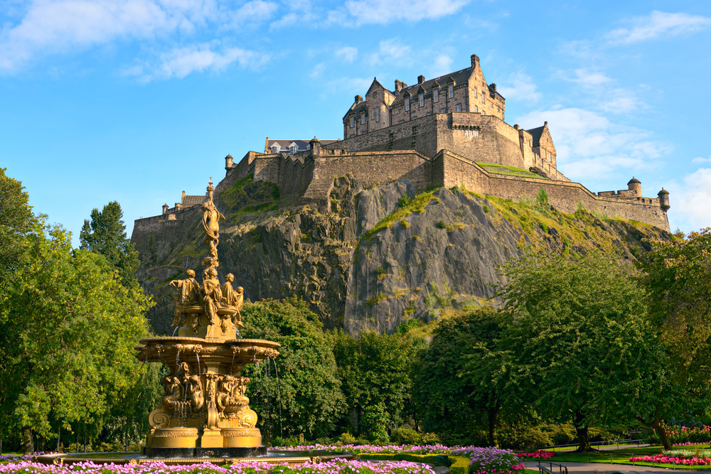 Edinburgh Castle, Scotland, from Princes Street Gardens with the Ross Fountain in the foreground.