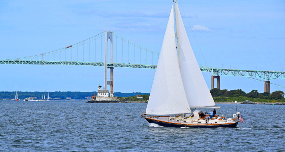 Sailboat near Fort Adams and Brenton Cove in Newport, Rhode Island.