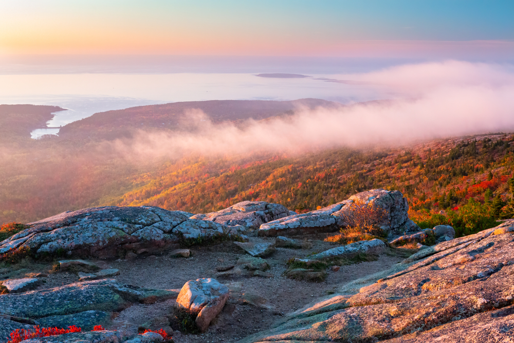 Autumn Sunrise in Acadia National Park, Maine from top of Cadillac Mountain.