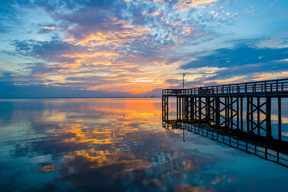 Beautiful colorful sunset on Mobile Bay situated on the Alabama Gulf Coast.