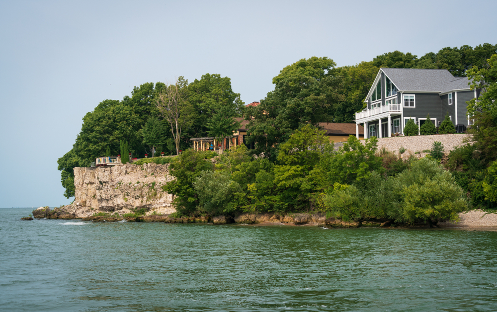 A lakehouse and shoreline seen from aboard the ferry at Put-in-Bay, Ohio.