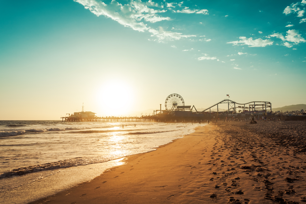 Sunset in Santa Monica, view of the amusement park on the pier.