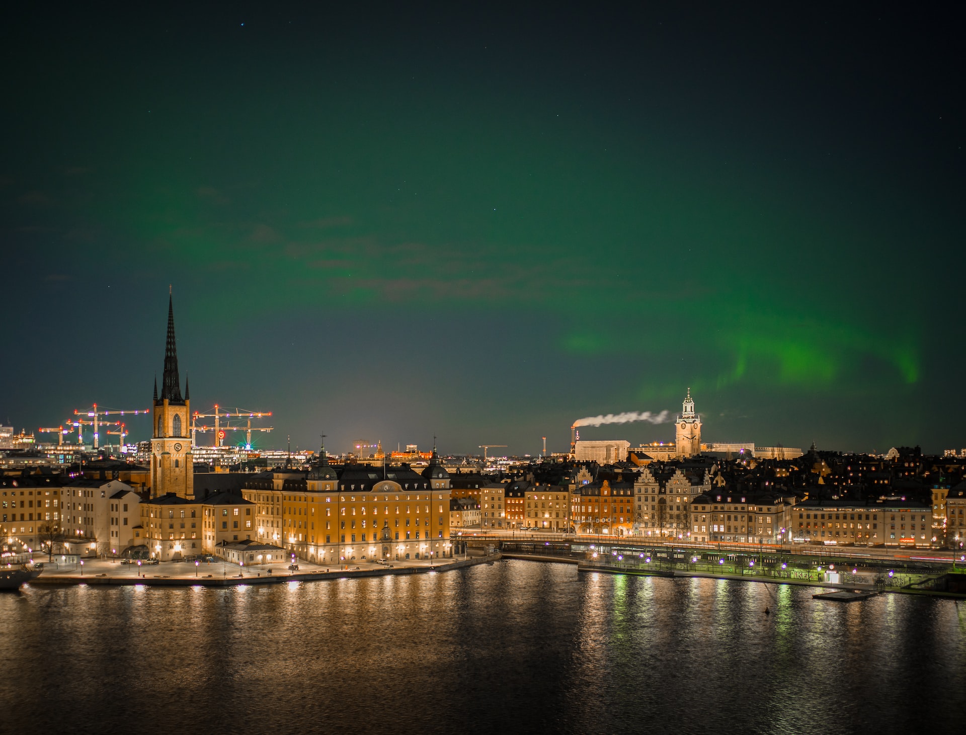 The northern lights over Stockholm at night.