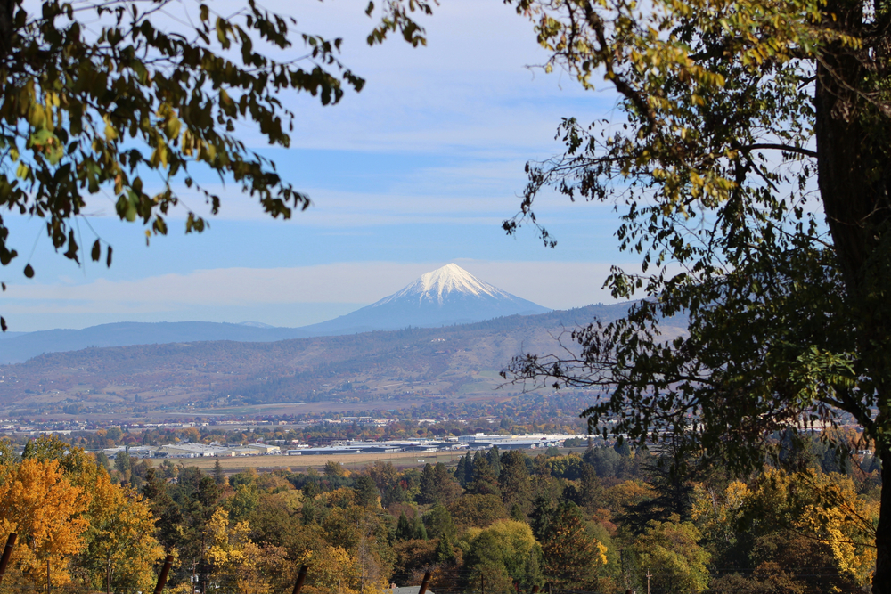 View of the Rogue Valley and snowy peak in the distance in Oregon.