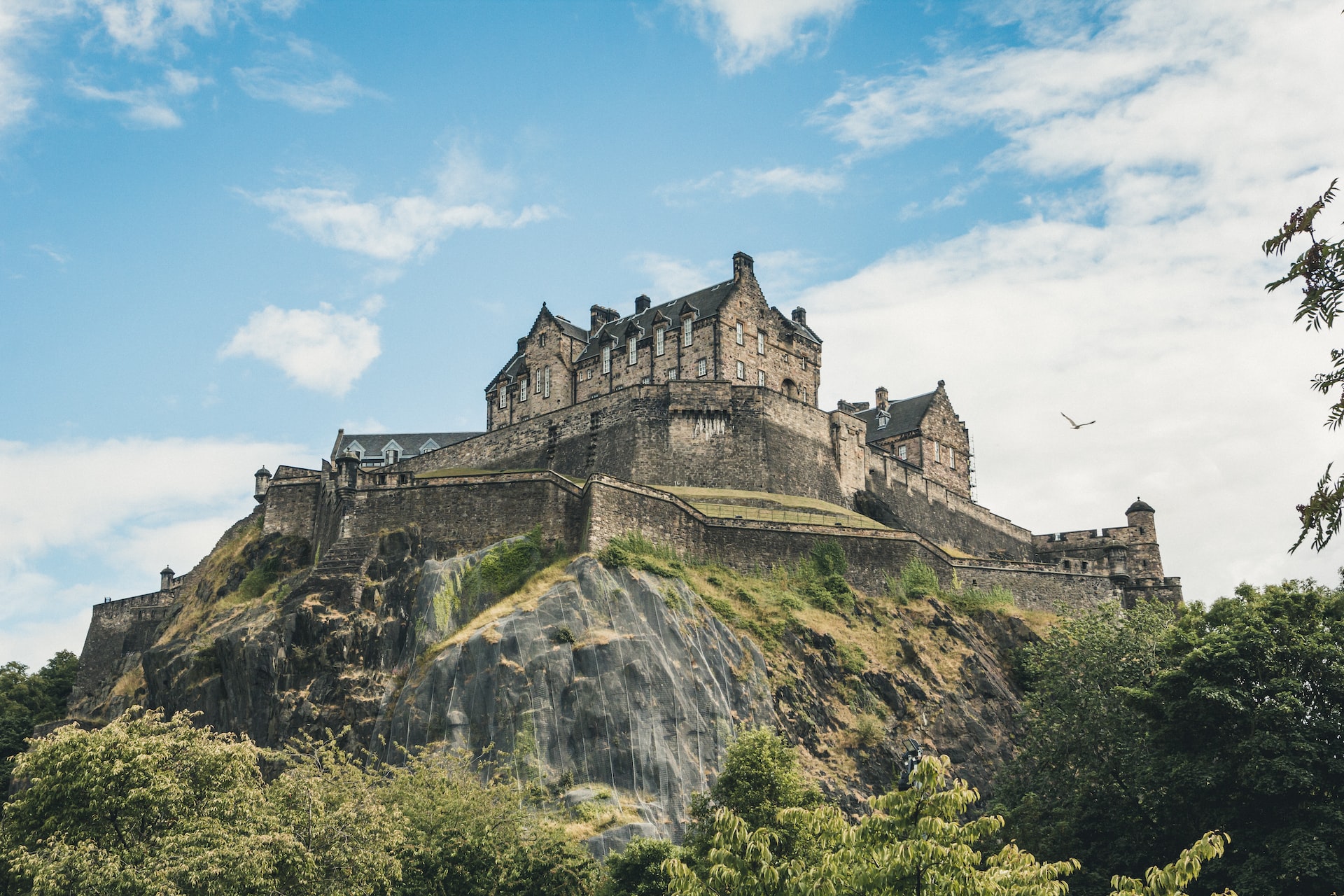 Edinburgh Castle perched high above the city on a fortified mountain. 