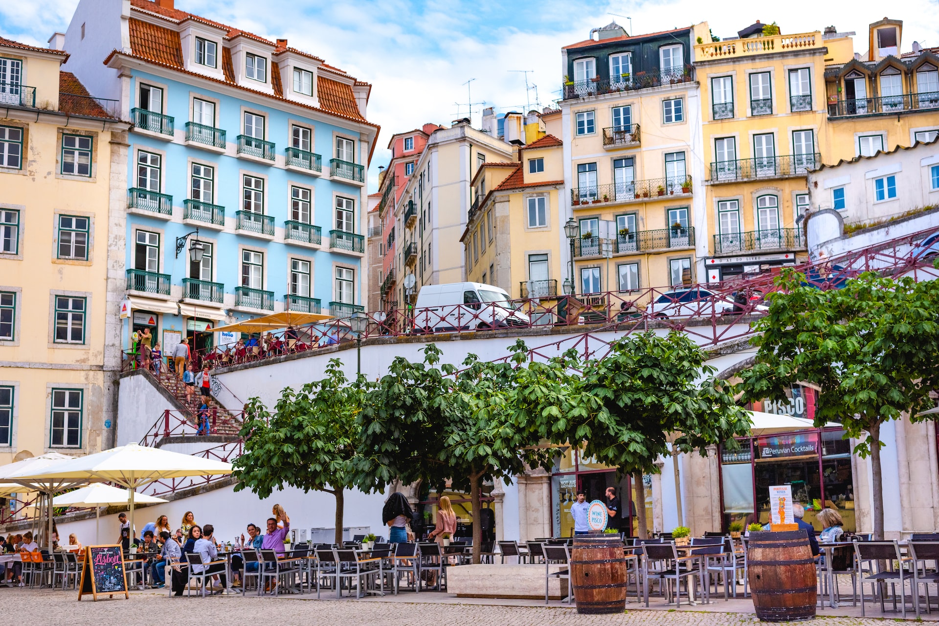 A cafe and colorful buildings in Lisbon.