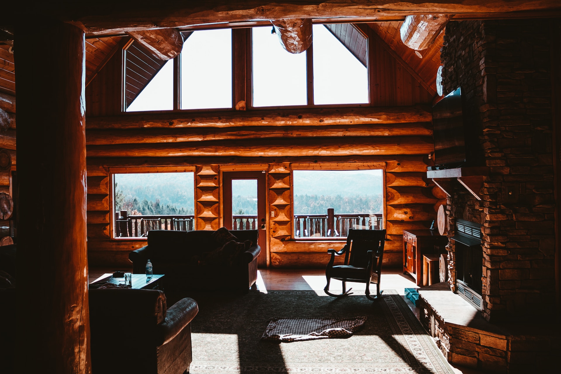 Big bay windows of a large family-sized cabin the Smoky Mountains.