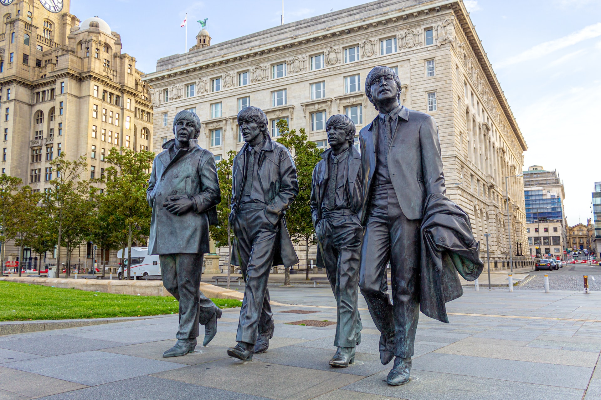 A statue of the Beatles strolling down a lane in Liverpool.