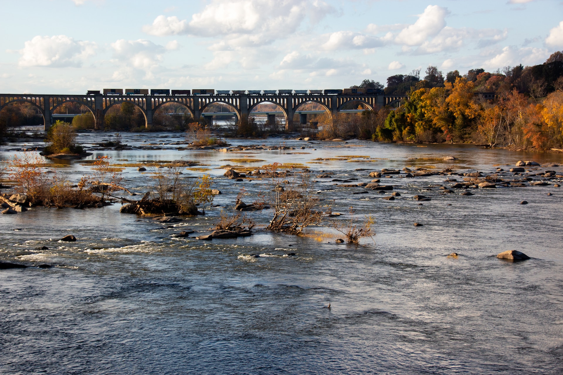 A train crossing a bridge over a river near Richmond, Virginia.
