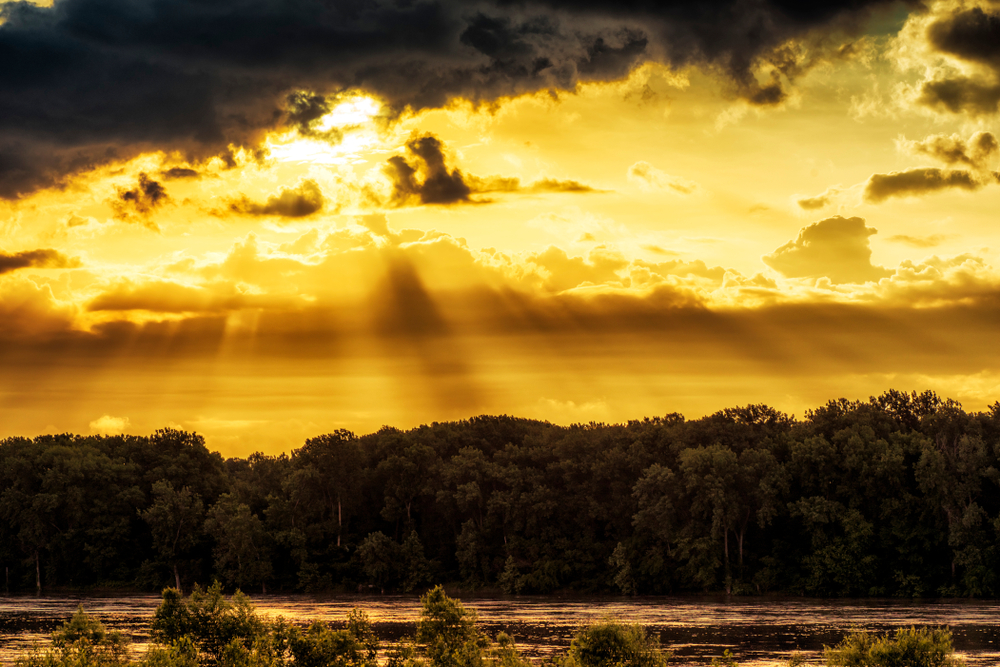 Light shines over the Missouri River, near the Katy Trail in St. Charles, Missouri.