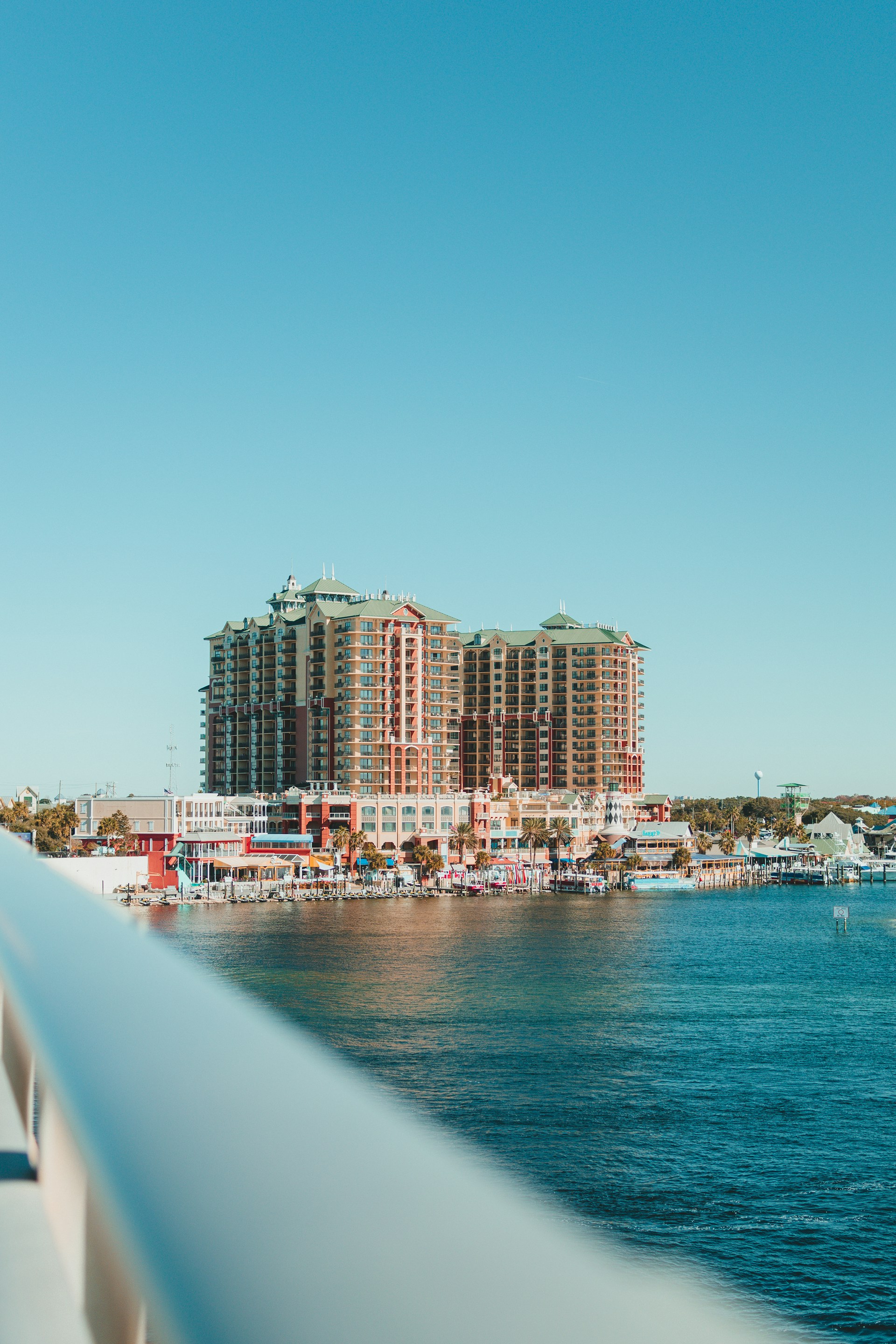 The view of a set of buildings on the beach front in Destin Florida