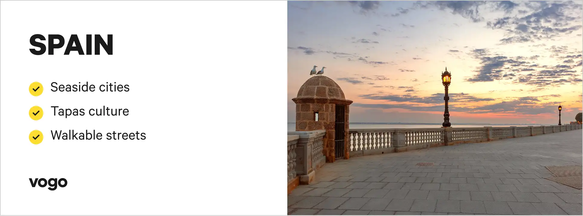 Sunset on the boardwalk in Cadiz, Spain. 